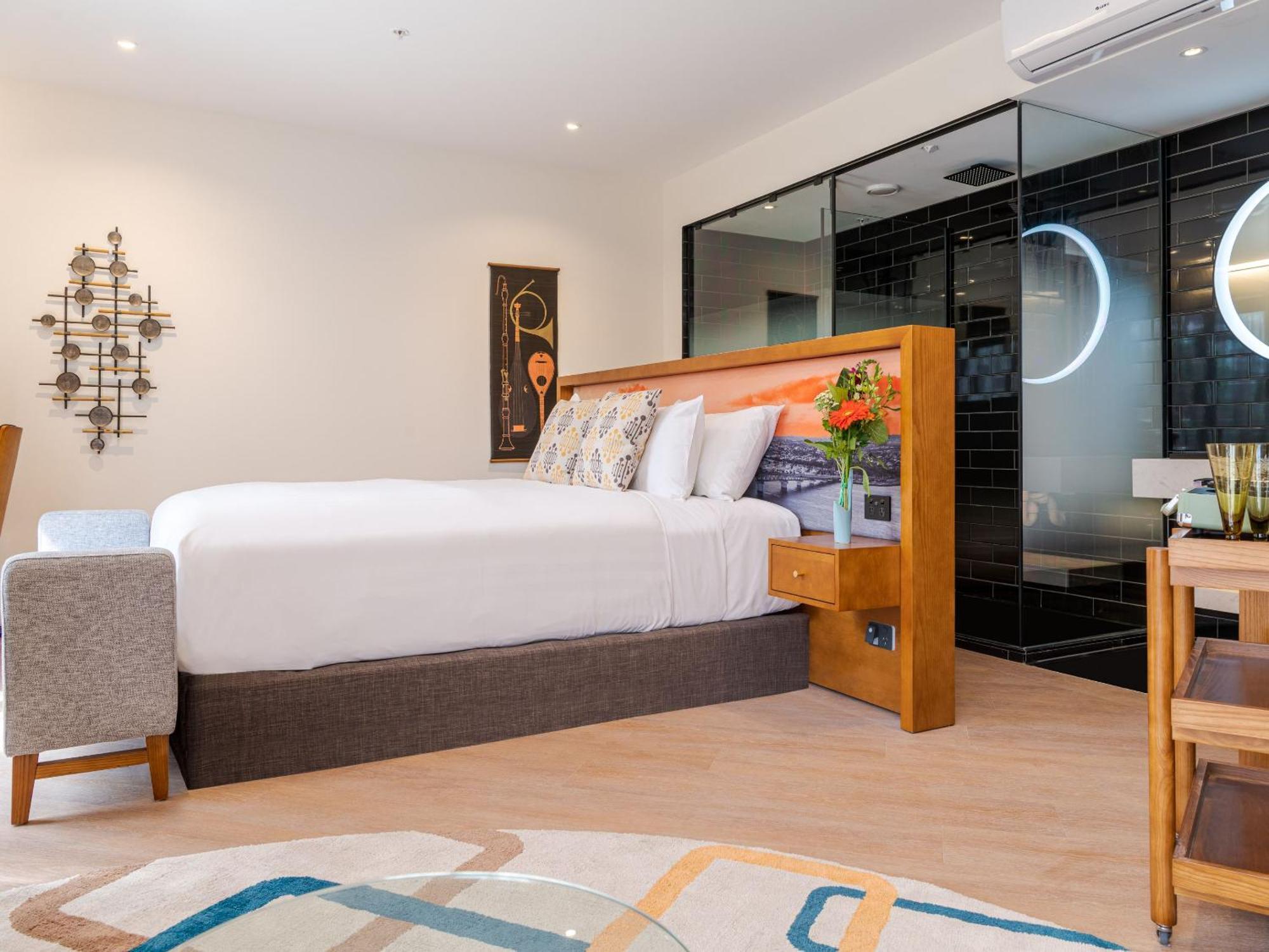 Ohtel Auckland Hotel Bagian luar foto A bedroom at the hotel
